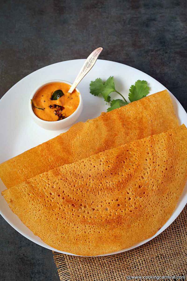 adai dosa in plate with chutney