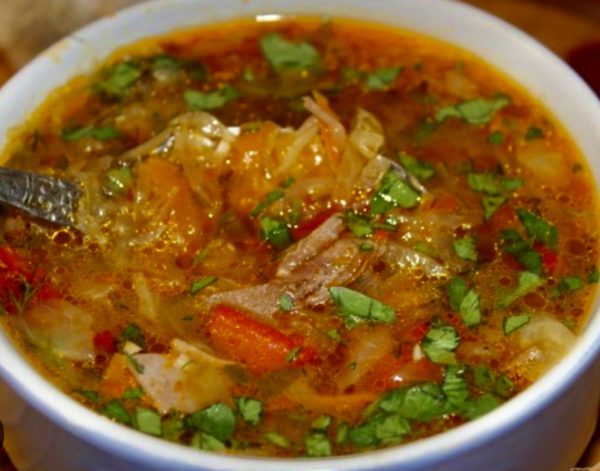 Village vegetable soup (schi) with chicken and mushrooms